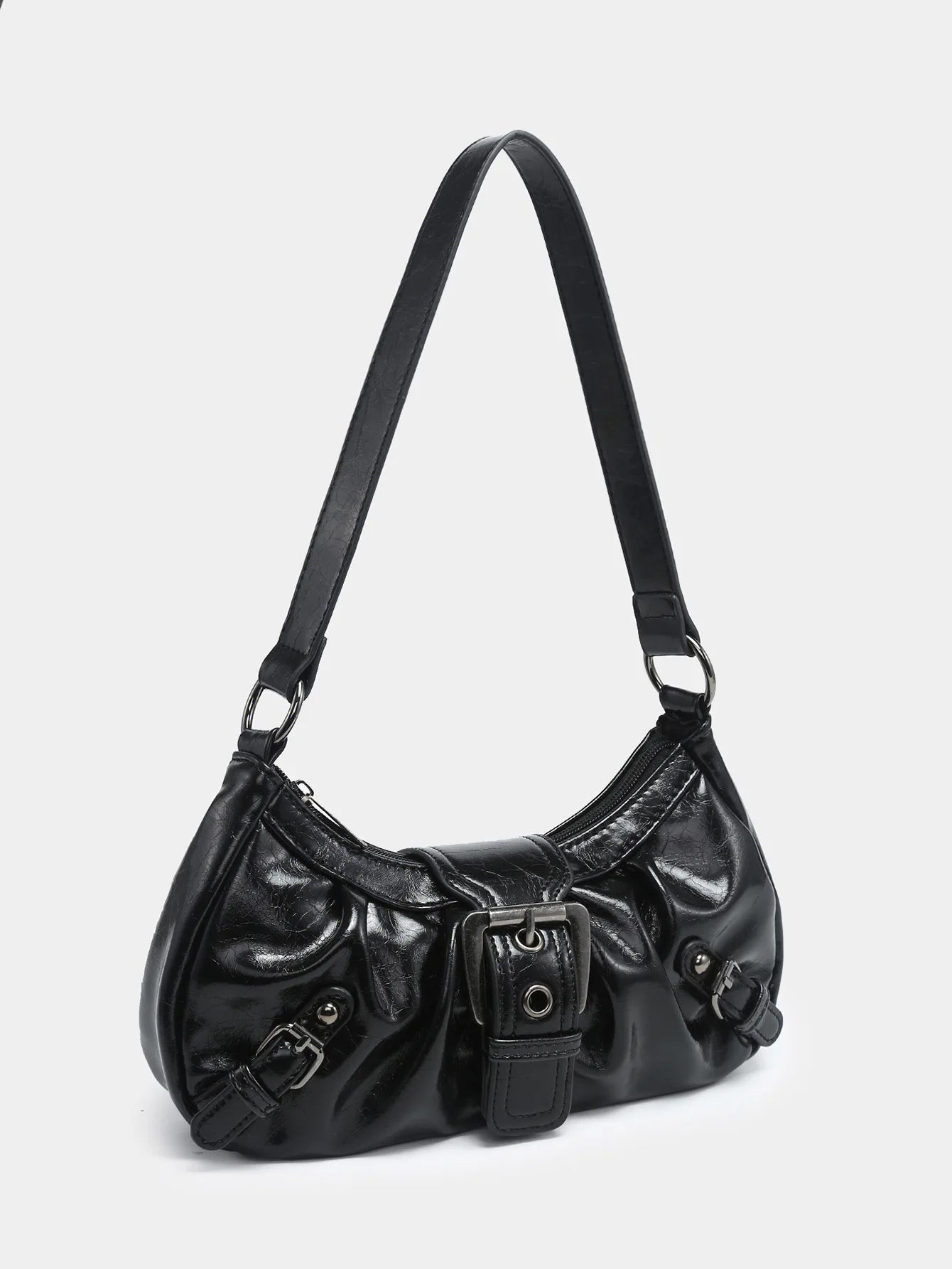 Y2K style leather shoulder bag in black with structured design and adjustable strap, a perfect vintage accessory.