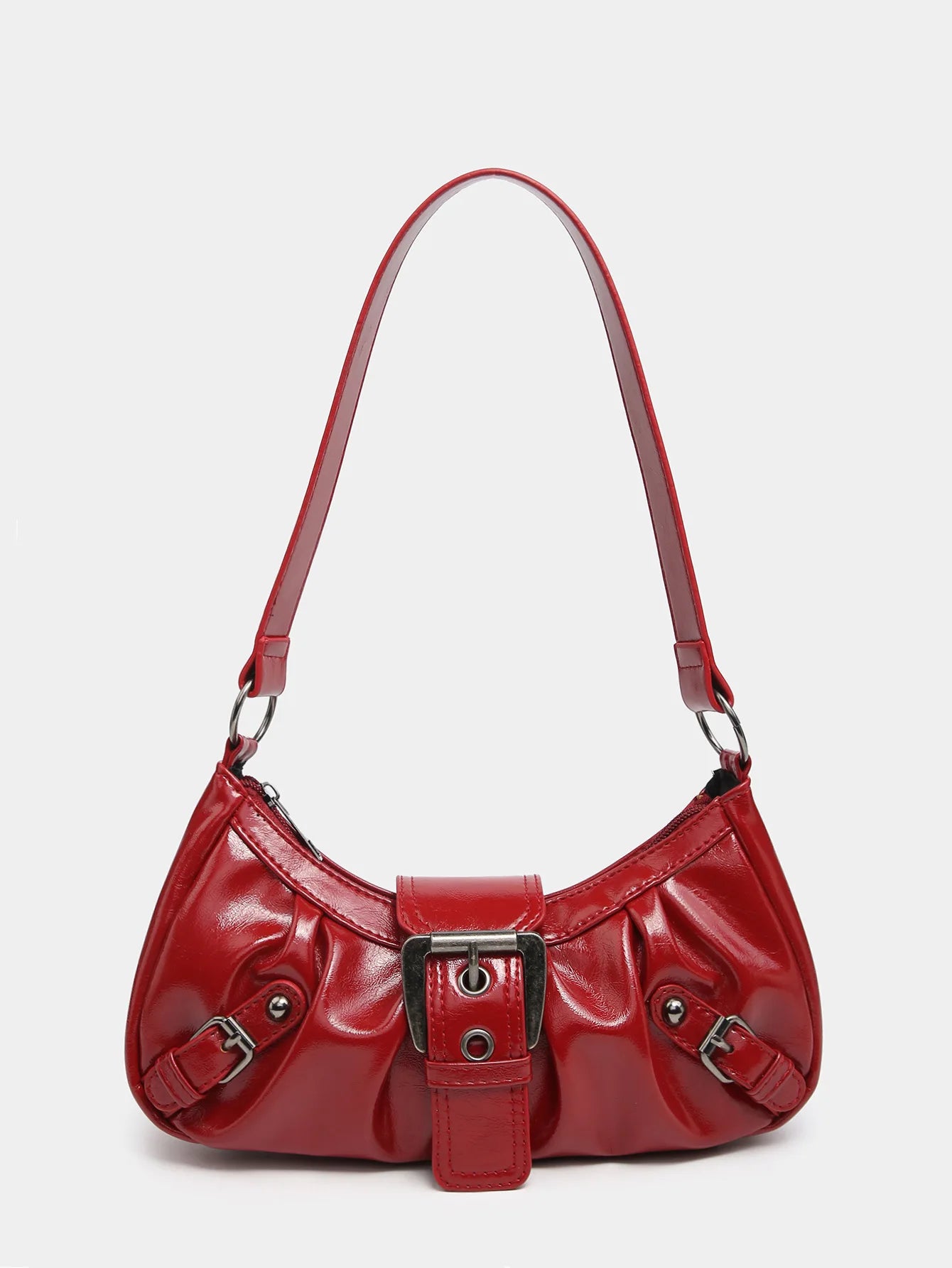 Y2K style red leather shoulder bag with structured design and buckle detail, perfect for vintage fashion lovers.